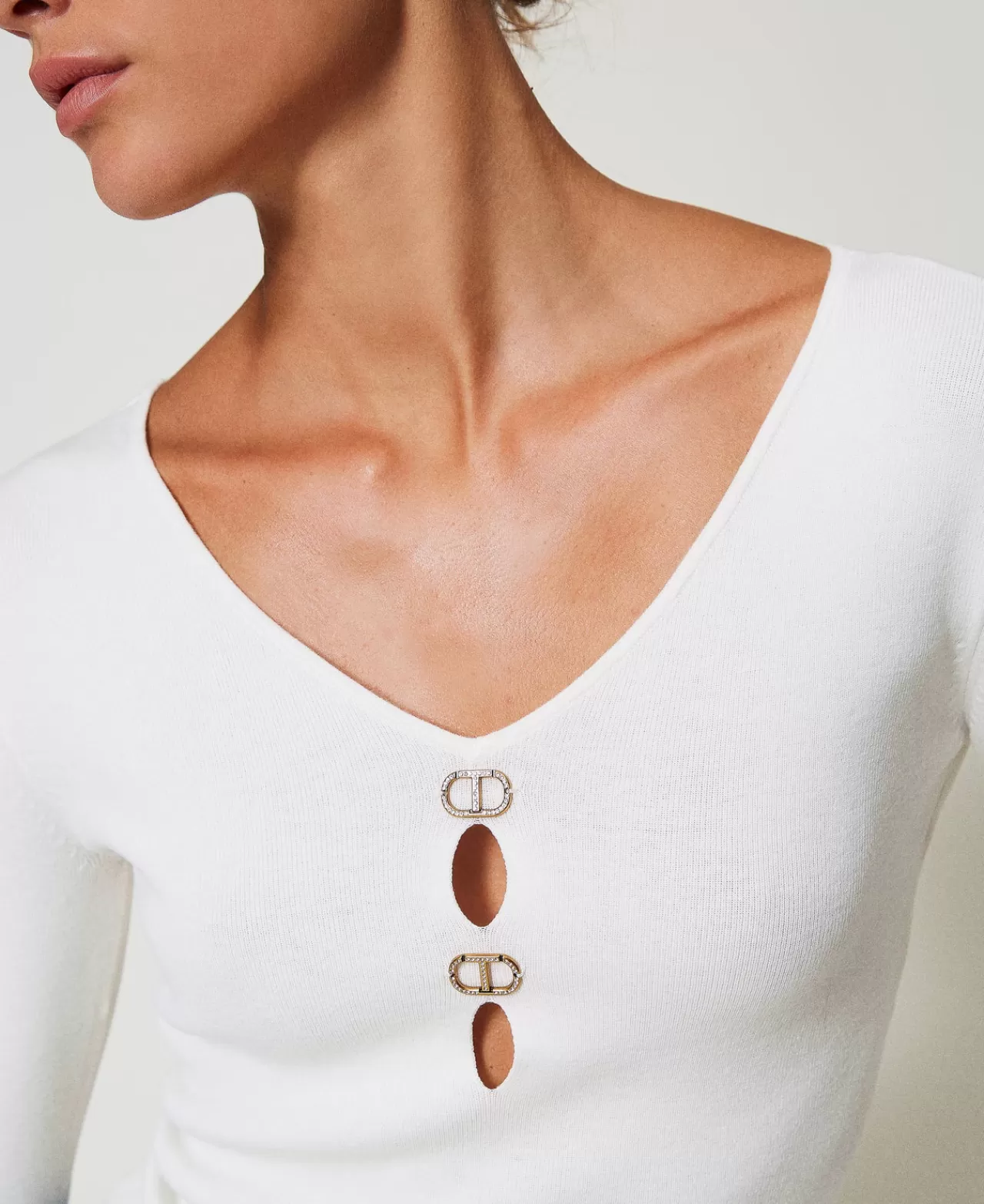 Pull dual Milano TWINSET - Col ovale et motif graphique intemporel