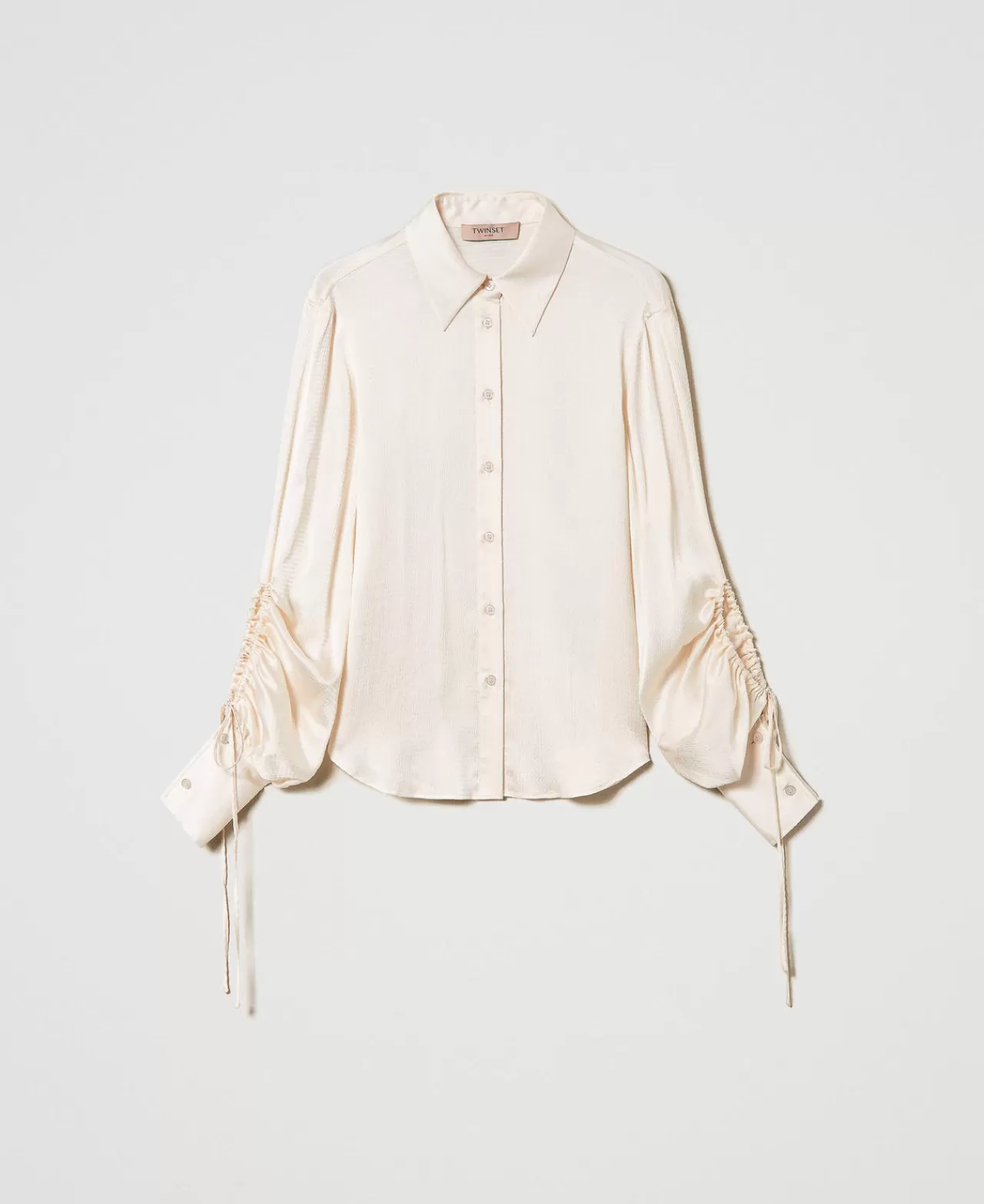 Chemise TWINSET Milano en satin texturé avec détails découpés - Élégance audacieuse pour votre garde-robe