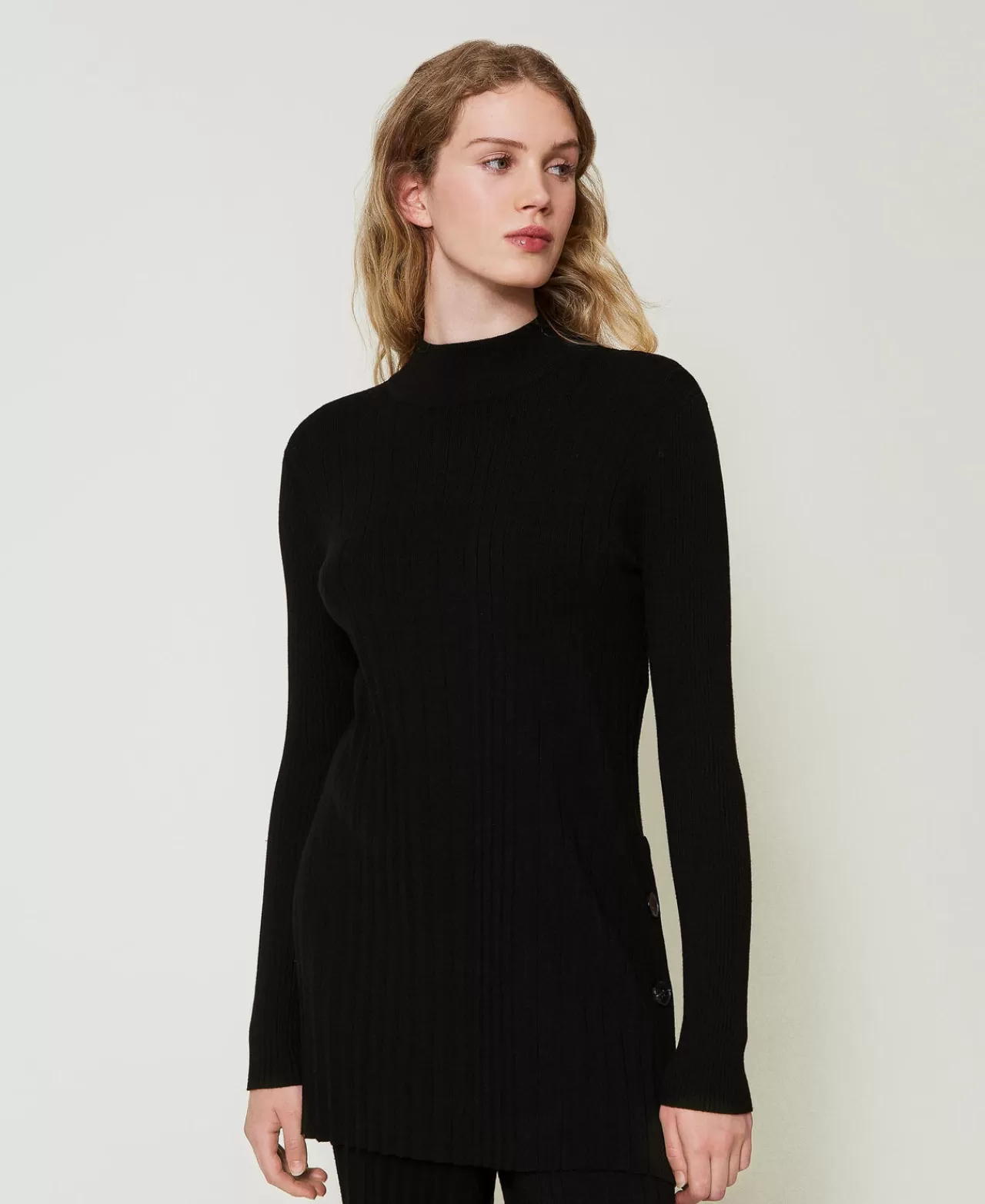 Pull long plissé Milano TWINSET - Fermeture boutonnée et coupe fluide pour un look urbain raffiné