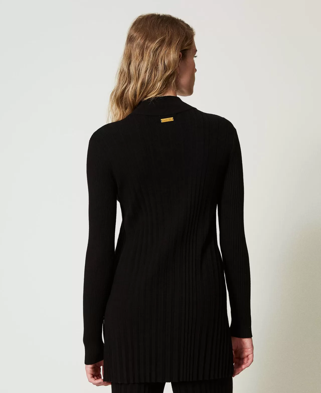 Pull long plissé Milano TWINSET - Fermeture boutonnée et coupe fluide pour un look urbain raffiné