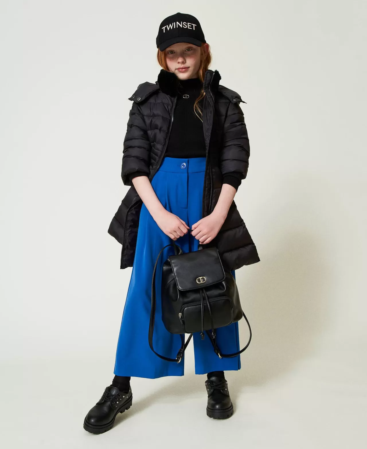 Sac à dos TWINSET Milano élégant - Compartiment principal spacieux avec pochette intégrée et design ovale stylisé - Idéal pour voyage urbain ou quotidien pratique