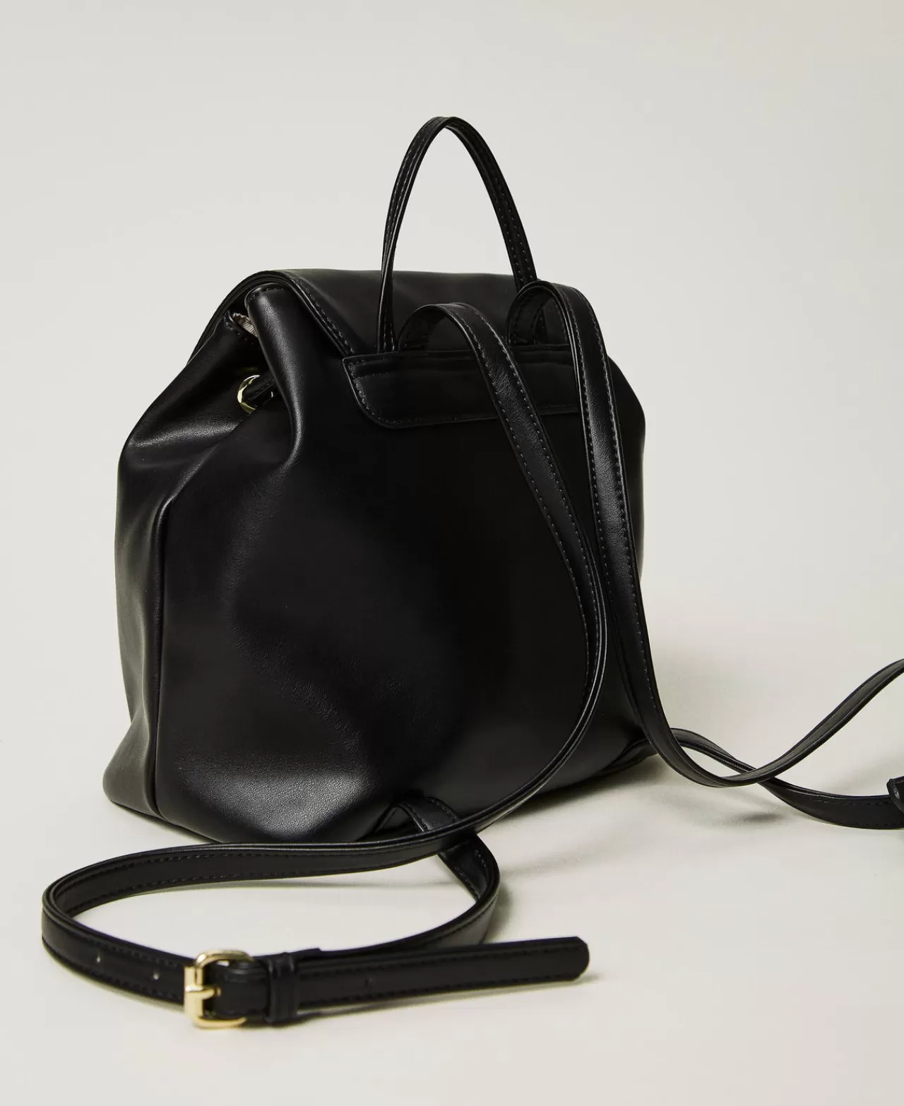 Sac à dos TWINSET Milano élégant - Compartiment principal spacieux avec pochette intégrée et design ovale stylisé - Idéal pour voyage urbain ou quotidien pratique