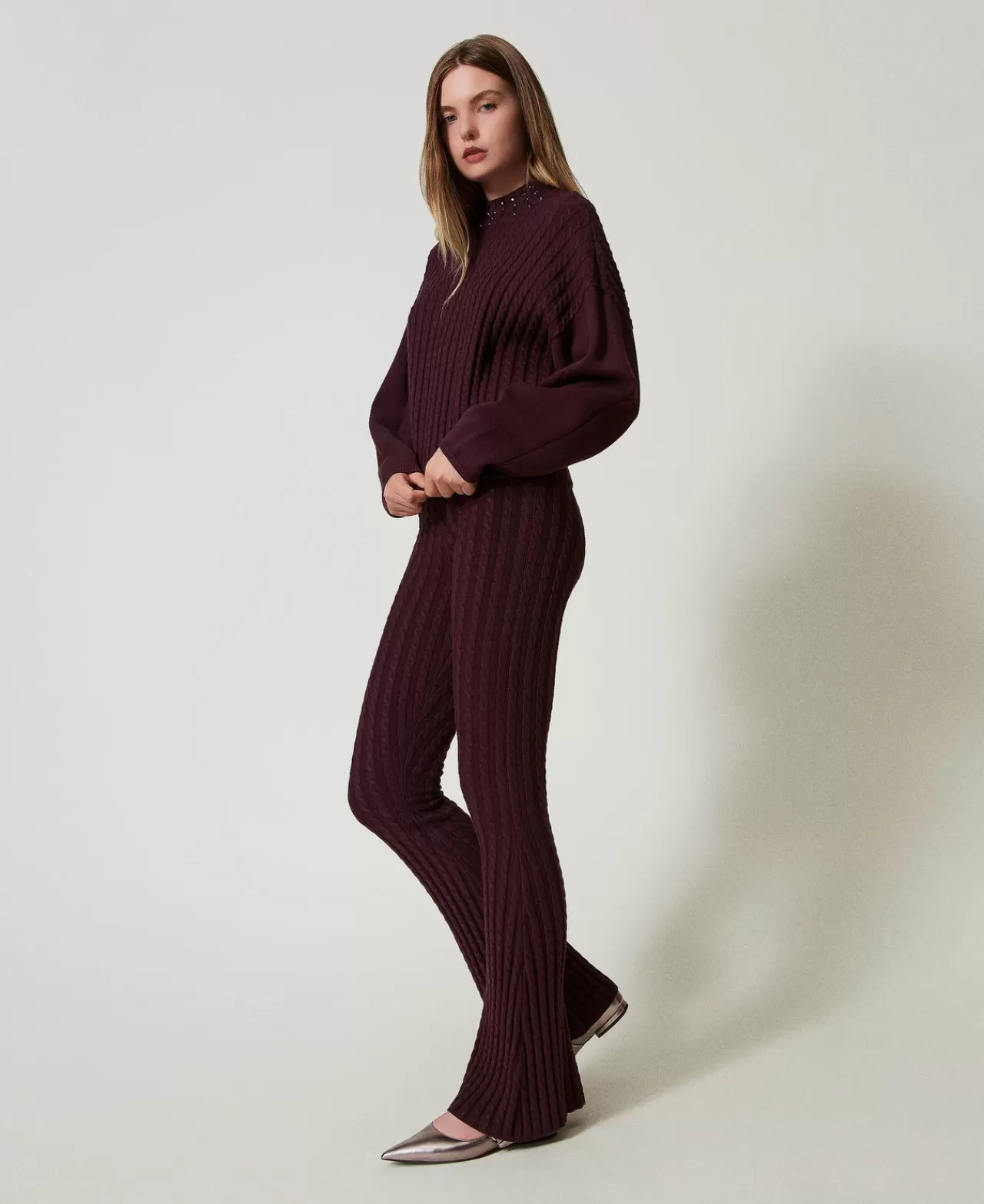 TWINSET Milano - Pantalon en Maille Côtelée à Effet Tresse - Coupe Flared Confortable pour Look Bohème Chic