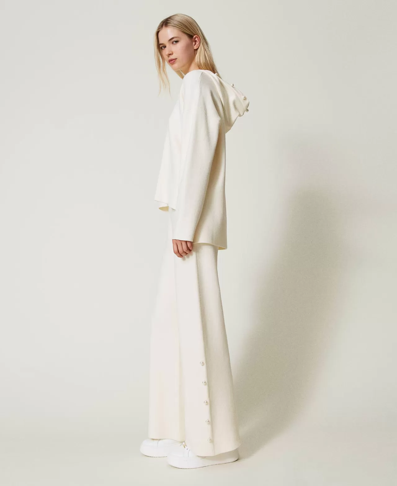 Pantalon fuseau évasé TWIN-SET Milano - Maille confort ornée de perles nacrées